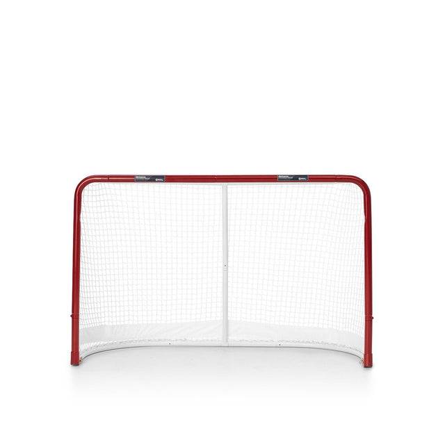 Extreme Hockey Goal Pro Steel med röd ram och vit nät, designad för att motstå hög hastighetsskjutningar och enkel förvaring.