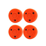 Fyrpack Green Biscuit Snipe orange puck, perfekta för klubbteknik hockey övningar på släta ytor.